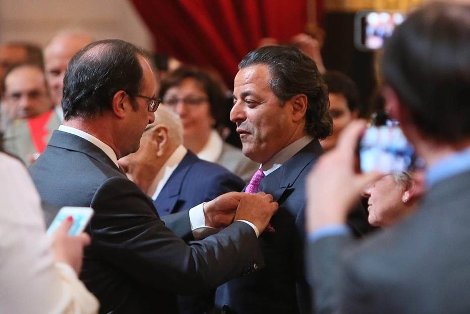 Chico receiving Legion Of Honor Medal from French President for 40 years of dedicated service in music.